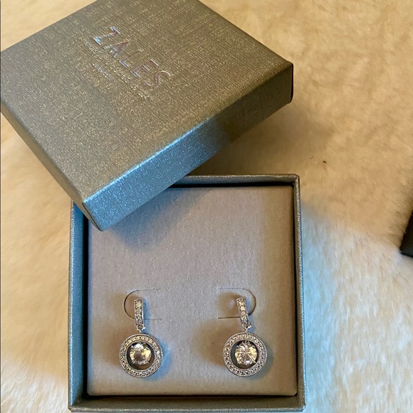 Zales Jewelry - White sapphire earrings bought at Zales years ago never been worn.